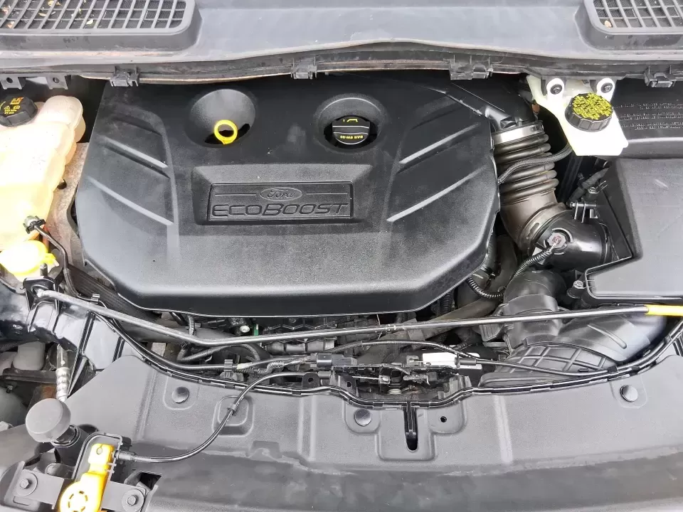 2014 Ford Escape Titanium (1FMCU9J99EU) with an 2.0L L4 DOHC 16V engine, 6-Speed Automatic transmission, located at 1099 N County Rd 25A , Troy, OH, 45373, (937) 908-9800, 40.057079, -84.212883 - Need one SUV that can handle an Ohio winter commute, school drop-offs, and a spontaneous weekend road trip to Hocking Hills without feeling like a compromise? This 2014 Ford Escape Titanium 4WD in sleek Tuxedo Black is built for real life in Troy-comfortable for long drives, confident in bad weather - Photo#11