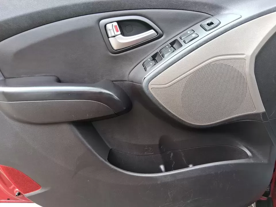 2013 Hyundai Tucson GLS (KM8JUCAC7DU) with an Theta II 2.4L I-4 DOHC engine, 6-Speed Automatic transmission, located at 1951 S Dayton Lakeview Rd., New Carlisle, OH, 45344, (937) 908-9800, 39.890999, -84.050255 - Need a dependable SUV that can handle Ohio weather, school drop-offs, and weekend getaways without stretching your budget? This 2013 Hyundai Tucson GLS in eye-catching Garnet Red is built for real life-comfortable for daily commuting, confident on slick winter roads, and practical for everything fro - Photo#17