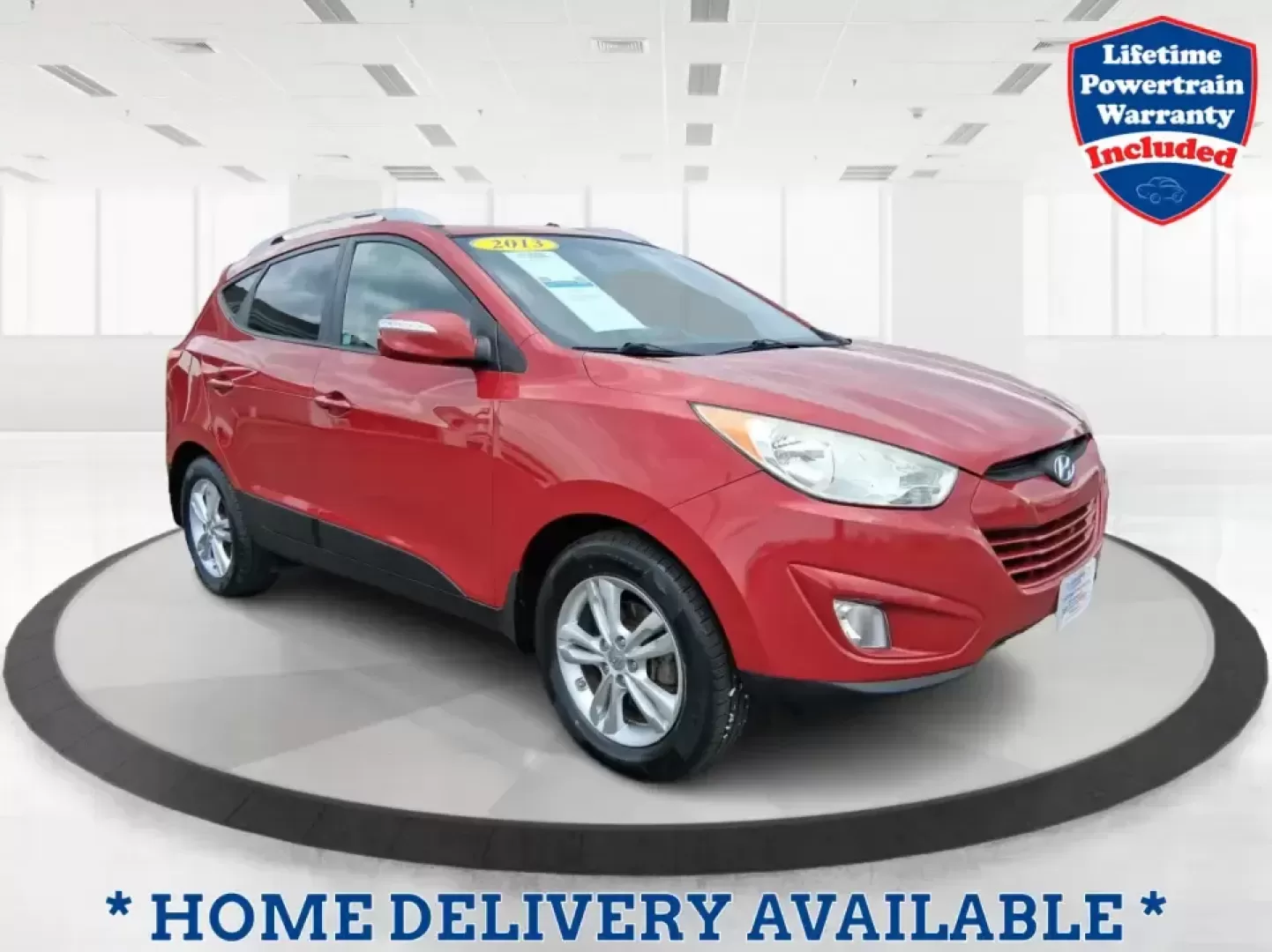 2013 Hyundai Tucson GLS (KM8JUCAC7DU) with an Theta II 2.4L I-4 DOHC engine, 6-Speed Automatic transmission, located at 8750 N County Rd 25A, Piqua, OH, 45356, (937) 908-9800, 40.164391, -84.232513 - Need a dependable SUV that can handle Ohio weather, school drop-offs, and weekend getaways without stretching your budget? This 2013 Hyundai Tucson GLS in eye-catching Garnet Red is built for real life-comfortable for daily commuting, confident on slick winter roads, and practical for everything fro - Photo#0