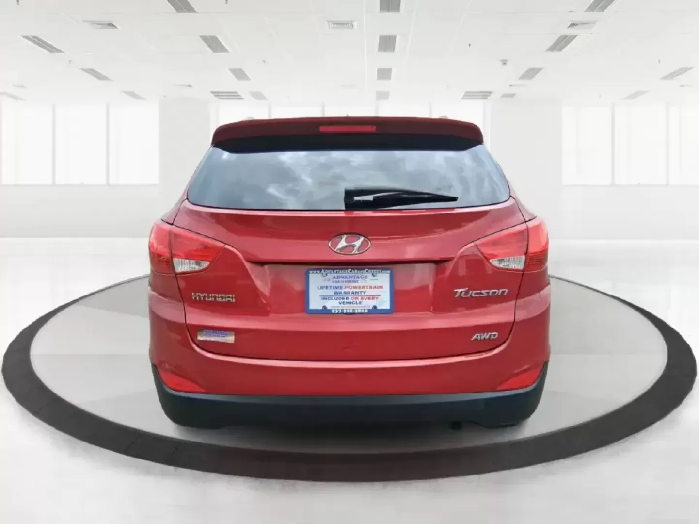 2013 Hyundai Tucson GLS (KM8JUCAC7DU) with an Theta II 2.4L I-4 DOHC engine, 6-Speed Automatic transmission, located at 8750 N County Rd 25A, Piqua, OH, 45356, (937) 908-9800, 40.164391, -84.232513 - Need a dependable SUV that can handle Ohio weather, school drop-offs, and weekend getaways without stretching your budget? This 2013 Hyundai Tucson GLS in eye-catching Garnet Red is built for real life-comfortable for daily commuting, confident on slick winter roads, and practical for everything fro - Photo#3