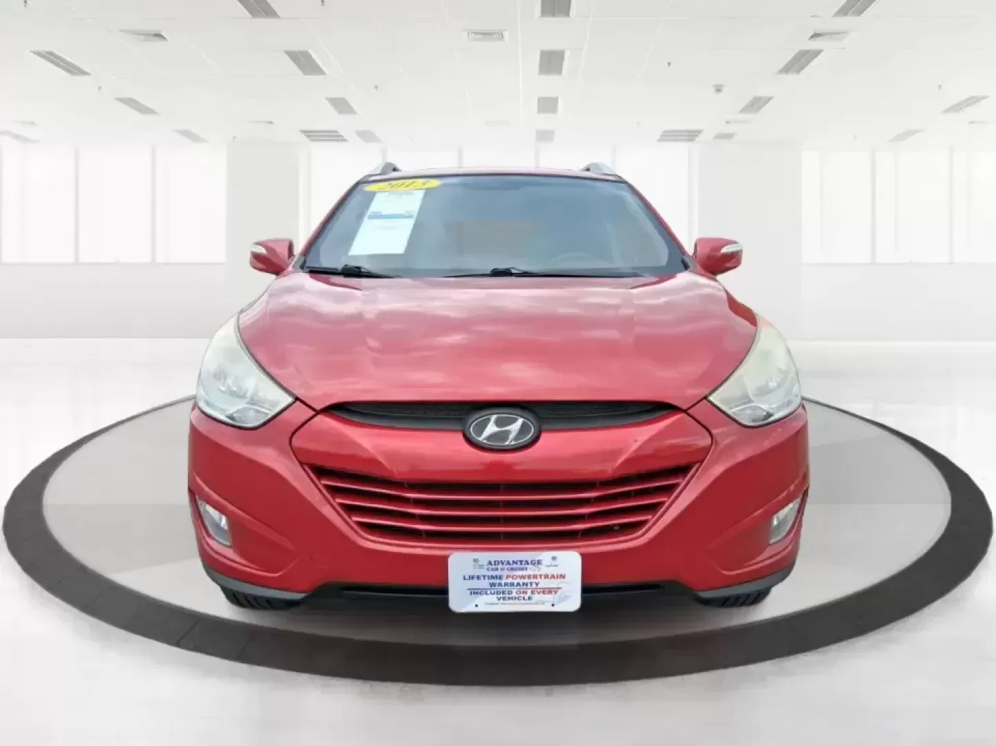 2013 Hyundai Tucson GLS (KM8JUCAC7DU) with an Theta II 2.4L I-4 DOHC engine, 6-Speed Automatic transmission, located at 8750 N County Rd 25A, Piqua, OH, 45356, (937) 908-9800, 40.164391, -84.232513 - Need a dependable SUV that can handle Ohio weather, school drop-offs, and weekend getaways without stretching your budget? This 2013 Hyundai Tucson GLS in eye-catching Garnet Red is built for real life-comfortable for daily commuting, confident on slick winter roads, and practical for everything fro - Photo#7