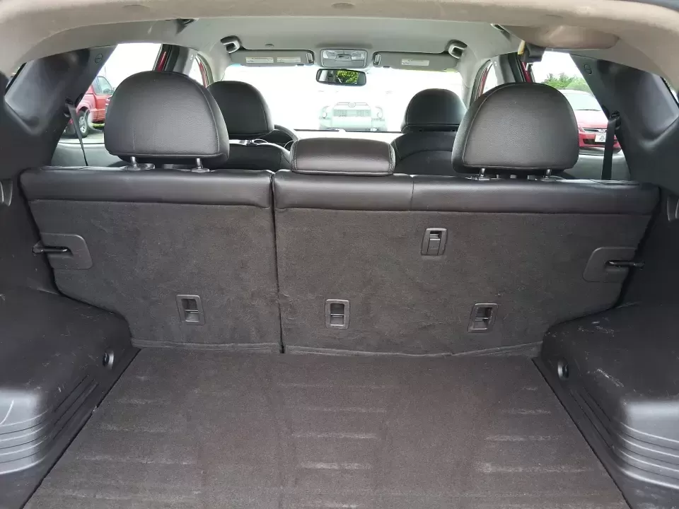 2013 Hyundai Tucson GLS (KM8JUCAC7DU) with an Theta II 2.4L I-4 DOHC engine, 6-Speed Automatic transmission, located at 8750 N County Rd 25A, Piqua, OH, 45356, (937) 908-9800, 40.164391, -84.232513 - Need a dependable SUV that can handle Ohio weather, school drop-offs, and weekend getaways without stretching your budget? This 2013 Hyundai Tucson GLS in eye-catching Garnet Red is built for real life-comfortable for daily commuting, confident on slick winter roads, and practical for everything fro - Photo#12