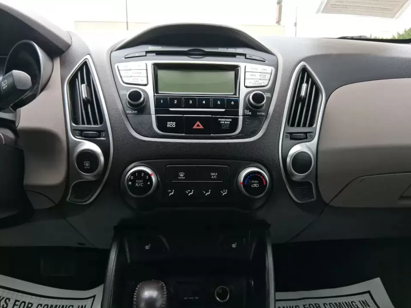 2013 Hyundai Tucson GLS (KM8JUCAC7DU) with an Theta II 2.4L I-4 DOHC engine, 6-Speed Automatic transmission, located at 8750 N County Rd 25A, Piqua, OH, 45356, (937) 908-9800, 40.164391, -84.232513 - Need a dependable SUV that can handle Ohio weather, school drop-offs, and weekend getaways without stretching your budget? This 2013 Hyundai Tucson GLS in eye-catching Garnet Red is built for real life-comfortable for daily commuting, confident on slick winter roads, and practical for everything fro - Photo#13