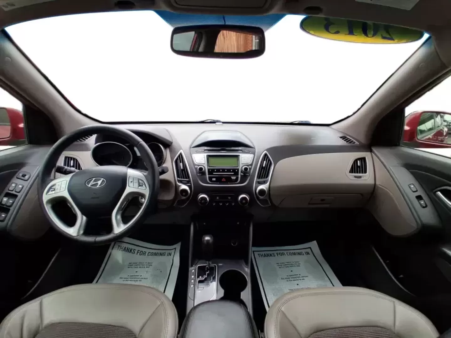 2013 Hyundai Tucson GLS (KM8JUCAC7DU) with an Theta II 2.4L I-4 DOHC engine, 6-Speed Automatic transmission, located at 8750 N County Rd 25A, Piqua, OH, 45356, (937) 908-9800, 40.164391, -84.232513 - Need a dependable SUV that can handle Ohio weather, school drop-offs, and weekend getaways without stretching your budget? This 2013 Hyundai Tucson GLS in eye-catching Garnet Red is built for real life-comfortable for daily commuting, confident on slick winter roads, and practical for everything fro - Photo#19