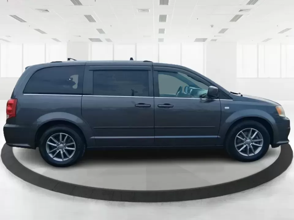 2014 Dodge Grand Caravan SXT 30th Anniversary (2C4RDGCGXER) with an 3.6L V-6 DOHC engine, 6-Speed Automatic transmission, located at 1951 S Dayton Lakeview Rd., New Carlisle, OH, 45344, (937) 908-9800, 39.890999, -84.050255 - Load up the kids, the coolers, and the weekend plans-this 2014 Dodge Grand Caravan SXT 30th Anniversary is built for real life in Ohio, whether you're handling school drop-offs, commuting down I70, or taking a road trip to the National Museum of the U.S. Air Force in nearby Dayton. With three rows a - Photo#1