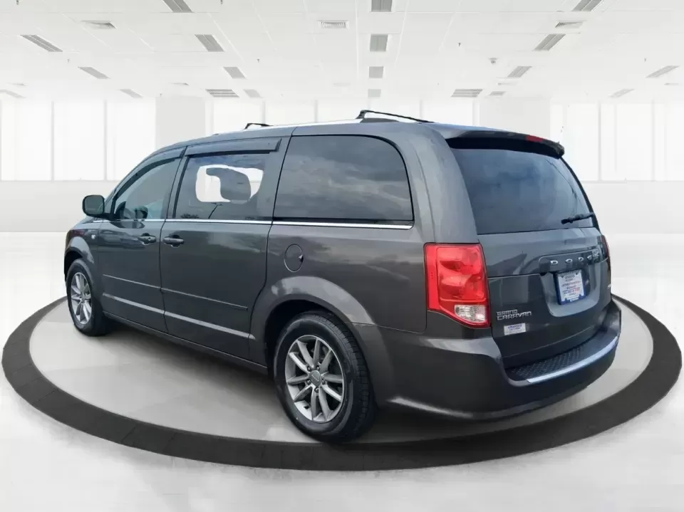 2014 Dodge Grand Caravan SXT 30th Anniversary (2C4RDGCGXER) with an 3.6L V-6 DOHC engine, 6-Speed Automatic transmission, located at 1951 S Dayton Lakeview Rd., New Carlisle, OH, 45344, (937) 908-9800, 39.890999, -84.050255 - Load up the kids, the coolers, and the weekend plans-this 2014 Dodge Grand Caravan SXT 30th Anniversary is built for real life in Ohio, whether you're handling school drop-offs, commuting down I70, or taking a road trip to the National Museum of the U.S. Air Force in nearby Dayton. With three rows a - Photo#4