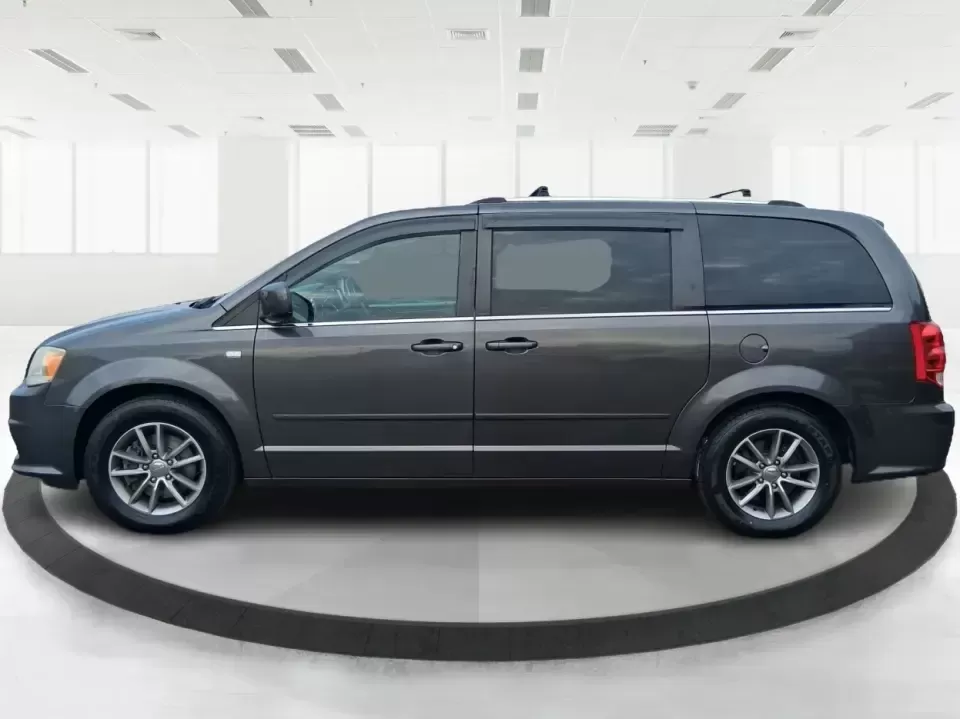 2014 Dodge Grand Caravan SXT 30th Anniversary (2C4RDGCGXER) with an 3.6L V-6 DOHC engine, 6-Speed Automatic transmission, located at 1951 S Dayton Lakeview Rd., New Carlisle, OH, 45344, (937) 908-9800, 39.890999, -84.050255 - Load up the kids, the coolers, and the weekend plans-this 2014 Dodge Grand Caravan SXT 30th Anniversary is built for real life in Ohio, whether you're handling school drop-offs, commuting down I70, or taking a road trip to the National Museum of the U.S. Air Force in nearby Dayton. With three rows a - Photo#5