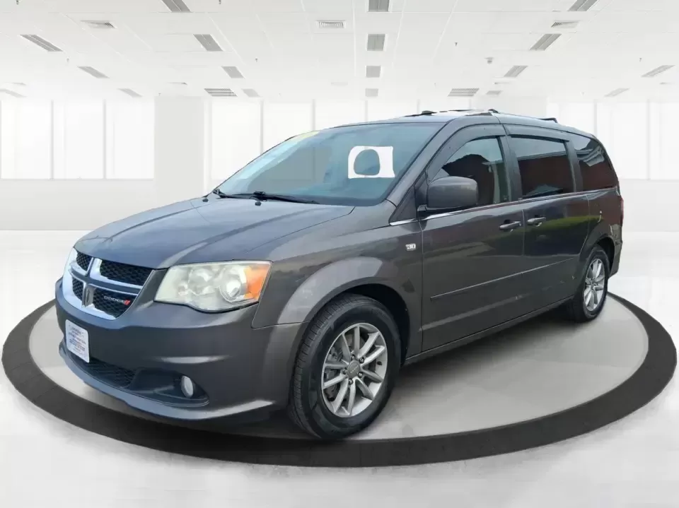 2014 Dodge Grand Caravan SXT 30th Anniversary (2C4RDGCGXER) with an 3.6L V-6 DOHC engine, 6-Speed Automatic transmission, located at 1951 S Dayton Lakeview Rd., New Carlisle, OH, 45344, (937) 908-9800, 39.890999, -84.050255 - Load up the kids, the coolers, and the weekend plans-this 2014 Dodge Grand Caravan SXT 30th Anniversary is built for real life in Ohio, whether you're handling school drop-offs, commuting down I70, or taking a road trip to the National Museum of the U.S. Air Force in nearby Dayton. With three rows a - Photo#8