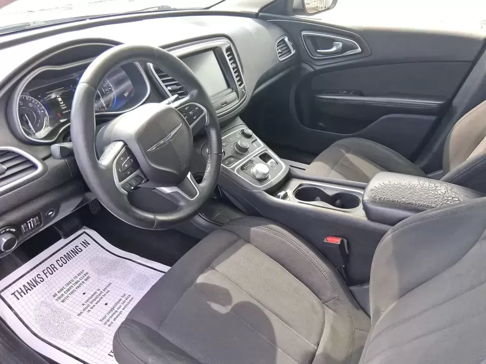 2015 Chrysler 200 Limited (1C3CCCAB5FN) with an 3.6L V-6 DOHC engine, 9-Speed Automatic transmission, located at 1230 East Main St, Xenia, OH, 45385, (937) 908-9800, 39.688026, -83.910172 - Picture an easy weekday commute from Xenia to Beavercreek or Dayton, then a comfortable Friday-night dinner run to downtown Yellow Springs-without giving up the refined feel you want in a daily driver. This 2015 Chrysler 200 Limited sedan is built for real life: smooth highway miles, school drop-off - Photo#9