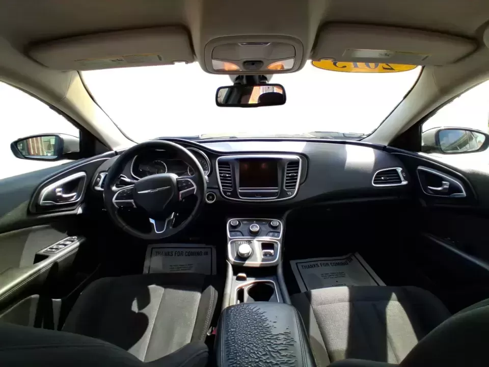 2015 Chrysler 200 Limited (1C3CCCAB5FN) with an 3.6L V-6 DOHC engine, 9-Speed Automatic transmission, located at 1230 East Main St, Xenia, OH, 45385, (937) 908-9800, 39.688026, -83.910172 - Picture an easy weekday commute from Xenia to Beavercreek or Dayton, then a comfortable Friday-night dinner run to downtown Yellow Springs-without giving up the refined feel you want in a daily driver. This 2015 Chrysler 200 Limited sedan is built for real life: smooth highway miles, school drop-off - Photo#21