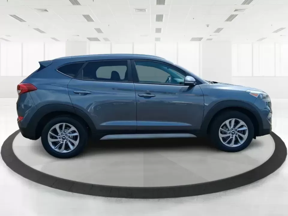 2018 Hyundai Tucson SEL Plus (KM8J33A4XJU) with an Nu 2L I-4 gasoline direct injection engine, 6A transmission, located at 1230 East Main St, Xenia, OH, 45385, (937) 908-9800, 39.688026, -83.910172 - Need a do-it-all SUV that fits real life in Greene County-school runs, long commutes to Dayton, and weekend getaways to John Bryan State Park-without sacrificing comfort or confidence? This 2018 Hyundai Tucson SEL Plus in Coliseum Gray is built for drivers who want practical space, modern tech, and - Photo#1
