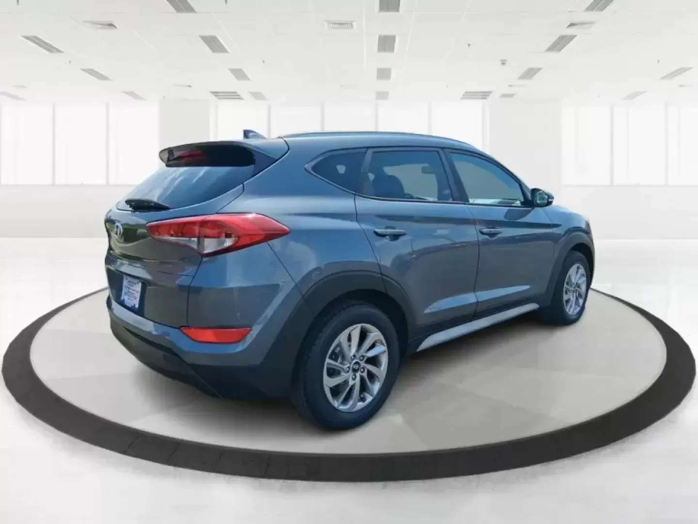 2018 Hyundai Tucson SEL Plus (KM8J33A4XJU) with an Nu 2L I-4 gasoline direct injection engine, 6A transmission, located at 880 E. National Road, Vandalia, OH, 45377, (937) 908-9800, 39.891918, -84.183594 - Need a do-it-all SUV that fits real life in Greene County-school runs, long commutes to Dayton, and weekend getaways to John Bryan State Park-without sacrificing comfort or confidence? This 2018 Hyundai Tucson SEL Plus in Coliseum Gray is built for drivers who want practical space, modern tech, and - Photo#2