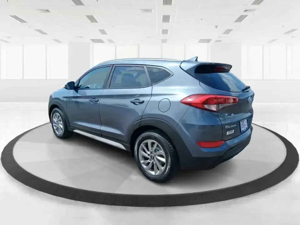 2018 Hyundai Tucson SEL Plus (KM8J33A4XJU) with an Nu 2L I-4 gasoline direct injection engine, 6A transmission, located at 1230 East Main St, Xenia, OH, 45385, (937) 908-9800, 39.688026, -83.910172 - Need a do-it-all SUV that fits real life in Greene County-school runs, long commutes to Dayton, and weekend getaways to John Bryan State Park-without sacrificing comfort or confidence? This 2018 Hyundai Tucson SEL Plus in Coliseum Gray is built for drivers who want practical space, modern tech, and - Photo#4