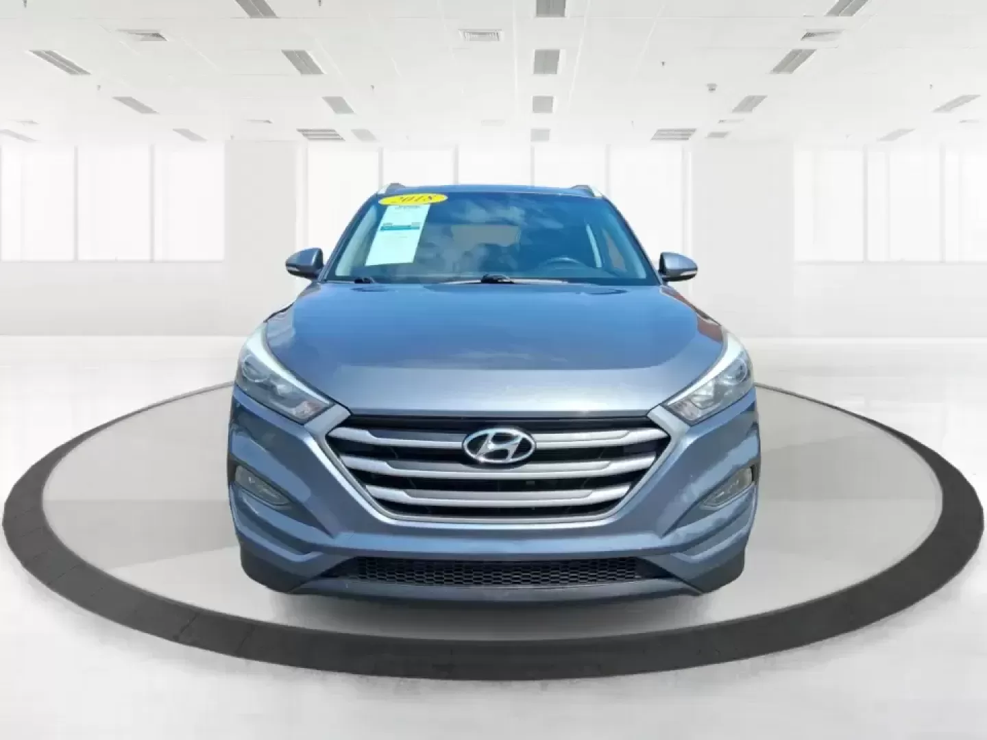 2018 Hyundai Tucson SEL Plus (KM8J33A4XJU) with an Nu 2L I-4 gasoline direct injection engine, 6A transmission, located at 880 E. National Road, Vandalia, OH, 45377, (937) 908-9800, 39.891918, -84.183594 - Need a do-it-all SUV that fits real life in Greene County-school runs, long commutes to Dayton, and weekend getaways to John Bryan State Park-without sacrificing comfort or confidence? This 2018 Hyundai Tucson SEL Plus in Coliseum Gray is built for drivers who want practical space, modern tech, and - Photo#7