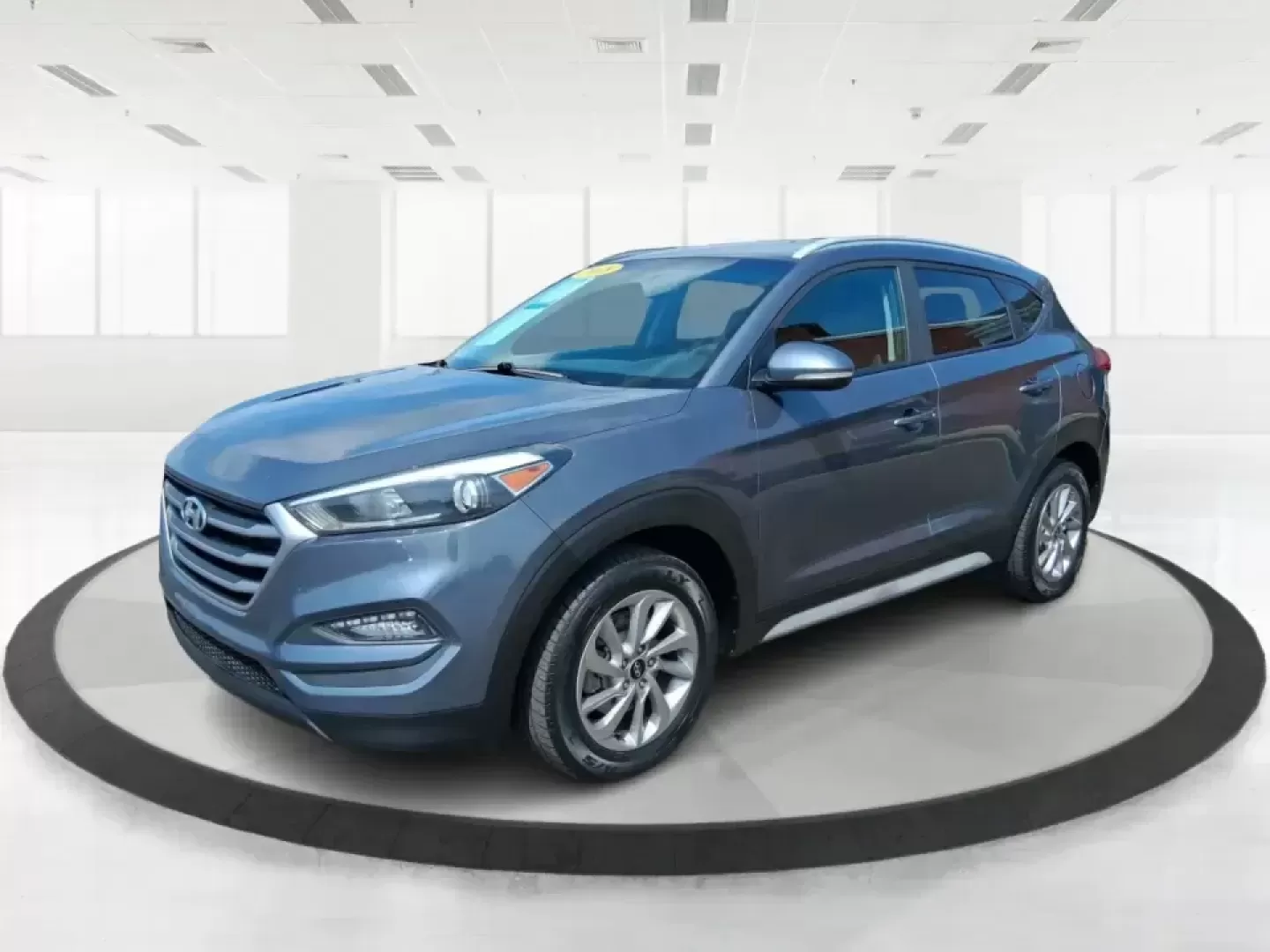 2018 Hyundai Tucson SEL Plus (KM8J33A4XJU) with an Nu 2L I-4 gasoline direct injection engine, 6A transmission, located at 880 E. National Road, Vandalia, OH, 45377, (937) 908-9800, 39.891918, -84.183594 - Need a do-it-all SUV that fits real life in Greene County-school runs, long commutes to Dayton, and weekend getaways to John Bryan State Park-without sacrificing comfort or confidence? This 2018 Hyundai Tucson SEL Plus in Coliseum Gray is built for drivers who want practical space, modern tech, and - Photo#8