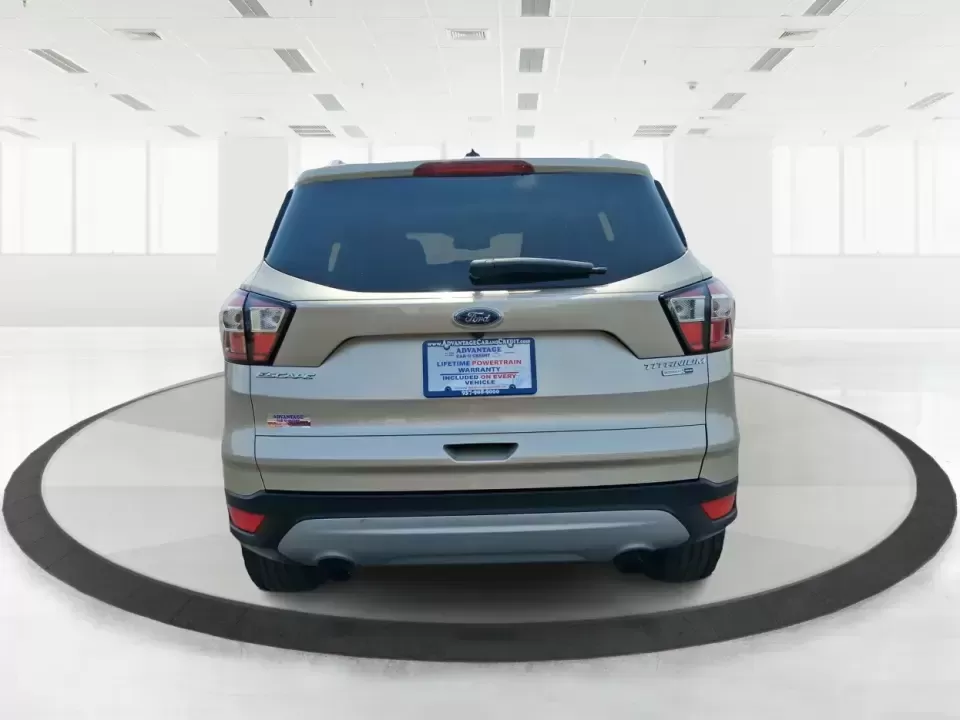 2017 Ford Escape Titanium (1FMCU9JD2HU) with an 1.5L L4 DOHC 16V engine, 6A transmission, located at 1230 East Main St, Xenia, OH, 45385, (937) 908-9800, 39.688026, -83.910172 - Whether you're a busy commuter running up and down US-35, a growing family juggling school drop-offs, or a weekend explorer heading out toward John Bryan State Park, this 2017 Ford Escape Titanium is the kind of compact SUV that fits real life in Xenia. With confident AWD capability, upscale comfort - Photo#3
