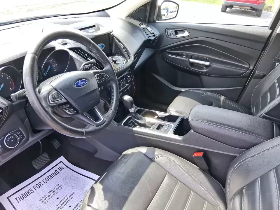 2017 Ford Escape Titanium (1FMCU9JD2HU) with an 1.5L L4 DOHC 16V engine, 6A transmission, located at 1230 East Main St, Xenia, OH, 45385, (937) 908-9800, 39.688026, -83.910172 - Whether you're a busy commuter running up and down US-35, a growing family juggling school drop-offs, or a weekend explorer heading out toward John Bryan State Park, this 2017 Ford Escape Titanium is the kind of compact SUV that fits real life in Xenia. With confident AWD capability, upscale comfort - Photo#9