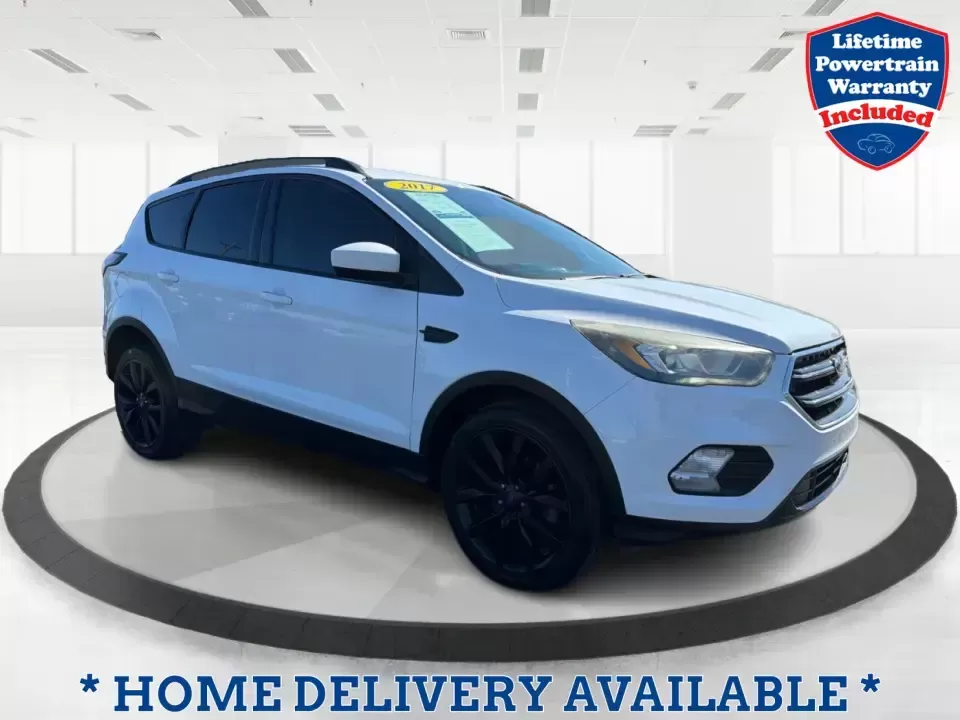 2017 Ford Escape SE (1FMCU0GD2HU) with an 1.5L L4 DOHC 16V engine, 6A transmission, located at 8750 N County Rd 25A, Piqua, OH, 45356, (937) 908-9800, 40.164391, -84.232513 - Picture a weekday that starts with a smooth commute up N County Rd 25A, turns into easy school drop-offs, and ends with a weekend escape to Indian Lake or a quick run down I75 for shopping and dinner-this 2017 Ford Escape SE is built for real life in and around Piqua, Ohio. Finished in standout Whit - Photo#0