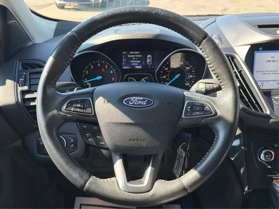 2017 Ford Escape SE (1FMCU0GD2HU) with an 1.5L L4 DOHC 16V engine, 6A transmission, located at 8750 N County Rd 25A, Piqua, OH, 45356, (937) 908-9800, 40.164391, -84.232513 - Picture a weekday that starts with a smooth commute up N County Rd 25A, turns into easy school drop-offs, and ends with a weekend escape to Indian Lake or a quick run down I75 for shopping and dinner-this 2017 Ford Escape SE is built for real life in and around Piqua, Ohio. Finished in standout Whit - Photo#16