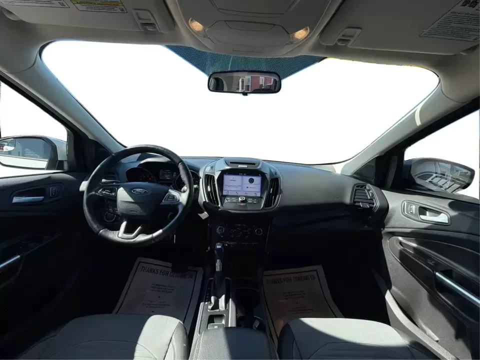 2017 Ford Escape SE (1FMCU0GD2HU) with an 1.5L L4 DOHC 16V engine, 6A transmission, located at 8750 N County Rd 25A, Piqua, OH, 45356, (937) 908-9800, 40.164391, -84.232513 - Picture a weekday that starts with a smooth commute up N County Rd 25A, turns into easy school drop-offs, and ends with a weekend escape to Indian Lake or a quick run down I75 for shopping and dinner-this 2017 Ford Escape SE is built for real life in and around Piqua, Ohio. Finished in standout Whit - Photo#22