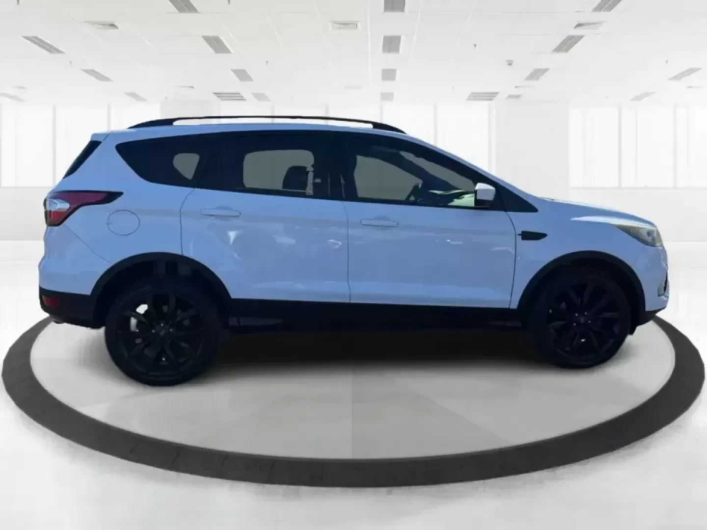2017 Ford Escape SE (1FMCU0GD2HU) with an 1.5L L4 DOHC 16V engine, 6A transmission, located at 401 Woodman Dr, Riverside, OH, 45431, (937) 908-9800, 39.760899, -84.123421 - Picture a weekday that starts with a smooth commute up N County Rd 25A, turns into easy school drop-offs, and ends with a weekend escape to Indian Lake or a quick run down I75 for shopping and dinner-this 2017 Ford Escape SE is built for real life in and around Piqua, Ohio. Finished in standout Whit - Photo#1