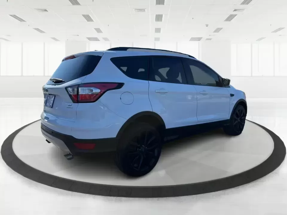 2017 Ford Escape SE (1FMCU0GD2HU) with an 1.5L L4 DOHC 16V engine, 6A transmission, located at 401 Woodman Dr, Riverside, OH, 45431, (937) 908-9800, 39.760899, -84.123421 - Picture a weekday that starts with a smooth commute up N County Rd 25A, turns into easy school drop-offs, and ends with a weekend escape to Indian Lake or a quick run down I75 for shopping and dinner-this 2017 Ford Escape SE is built for real life in and around Piqua, Ohio. Finished in standout Whit - Photo#2