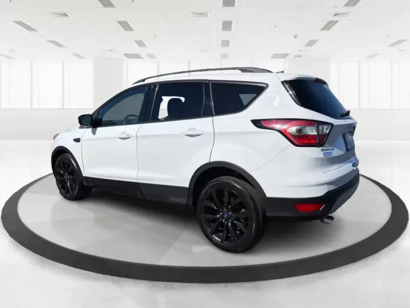 2017 Ford Escape SE (1FMCU0GD2HU) with an 1.5L L4 DOHC 16V engine, 6A transmission, located at 401 Woodman Dr, Riverside, OH, 45431, (937) 908-9800, 39.760899, -84.123421 - Picture a weekday that starts with a smooth commute up N County Rd 25A, turns into easy school drop-offs, and ends with a weekend escape to Indian Lake or a quick run down I75 for shopping and dinner-this 2017 Ford Escape SE is built for real life in and around Piqua, Ohio. Finished in standout Whit - Photo#4