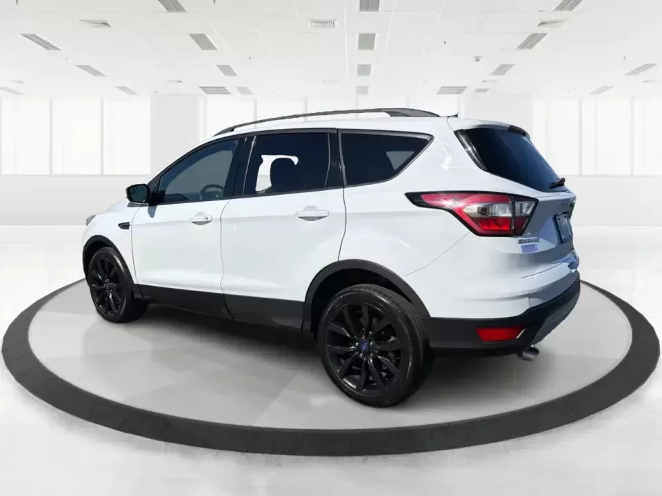 2017 Ford Escape SE (1FMCU0GD2HU) with an 1.5L L4 DOHC 16V engine, 6A transmission, located at 401 Woodman Dr, Riverside, OH, 45431, (937) 908-9800, 39.760899, -84.123421 - Picture a weekday that starts with a smooth commute up N County Rd 25A, turns into easy school drop-offs, and ends with a weekend escape to Indian Lake or a quick run down I75 for shopping and dinner-this 2017 Ford Escape SE is built for real life in and around Piqua, Ohio. Finished in standout Whit - Photo#4