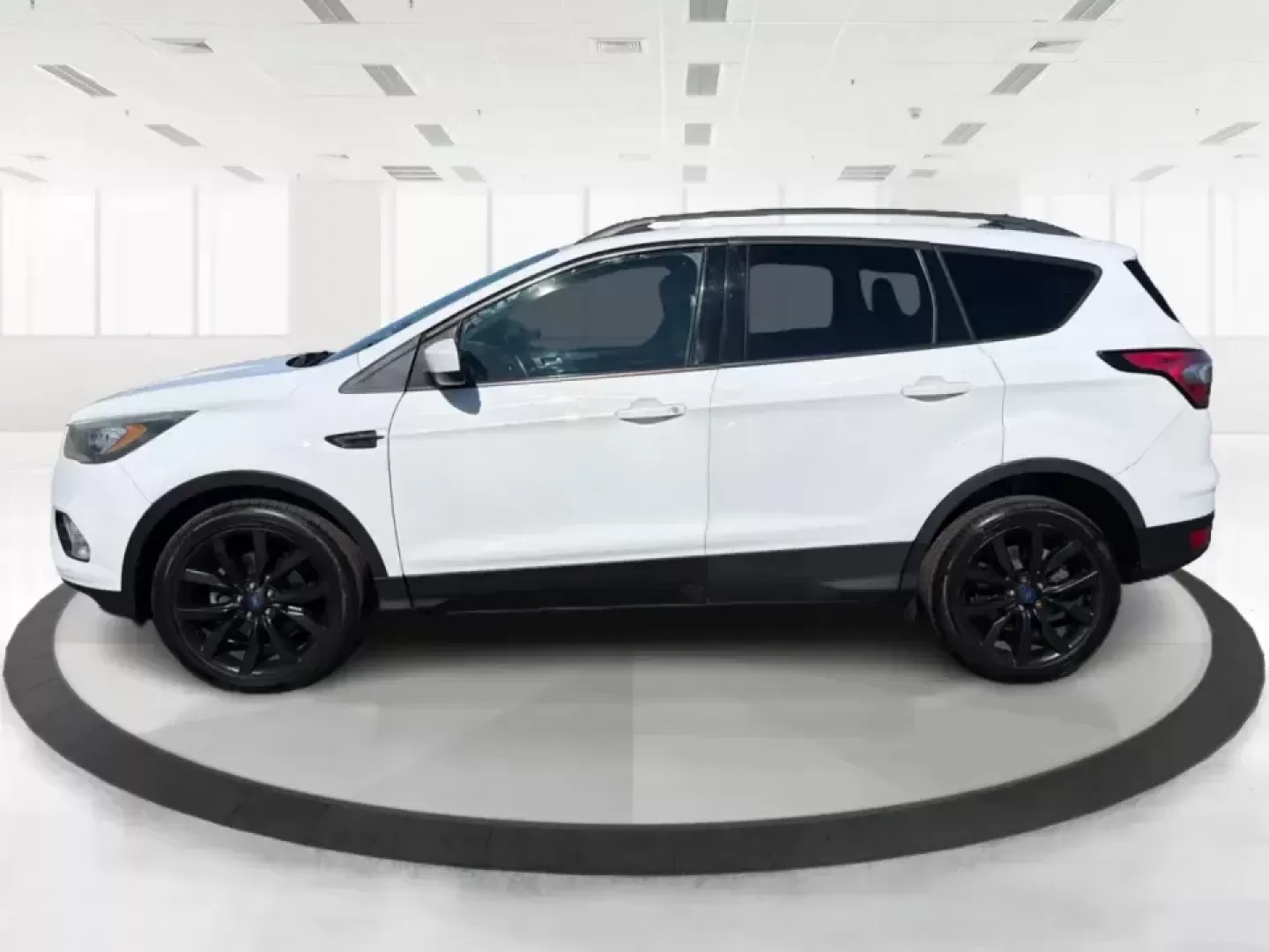 2017 Ford Escape SE (1FMCU0GD2HU) with an 1.5L L4 DOHC 16V engine, 6A transmission, located at 401 Woodman Dr, Riverside, OH, 45431, (937) 908-9800, 39.760899, -84.123421 - Picture a weekday that starts with a smooth commute up N County Rd 25A, turns into easy school drop-offs, and ends with a weekend escape to Indian Lake or a quick run down I75 for shopping and dinner-this 2017 Ford Escape SE is built for real life in and around Piqua, Ohio. Finished in standout Whit - Photo#5