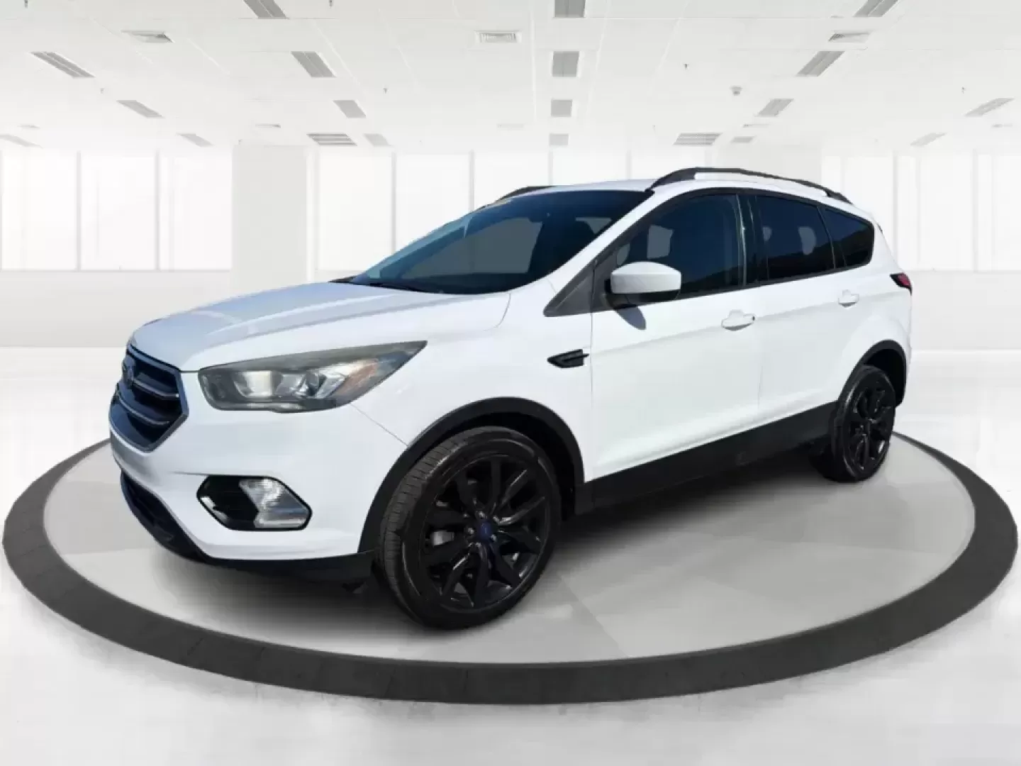 2017 Ford Escape SE (1FMCU0GD2HU) with an 1.5L L4 DOHC 16V engine, 6A transmission, located at 401 Woodman Dr, Riverside, OH, 45431, (937) 908-9800, 39.760899, -84.123421 - Picture a weekday that starts with a smooth commute up N County Rd 25A, turns into easy school drop-offs, and ends with a weekend escape to Indian Lake or a quick run down I75 for shopping and dinner-this 2017 Ford Escape SE is built for real life in and around Piqua, Ohio. Finished in standout Whit - Photo#8