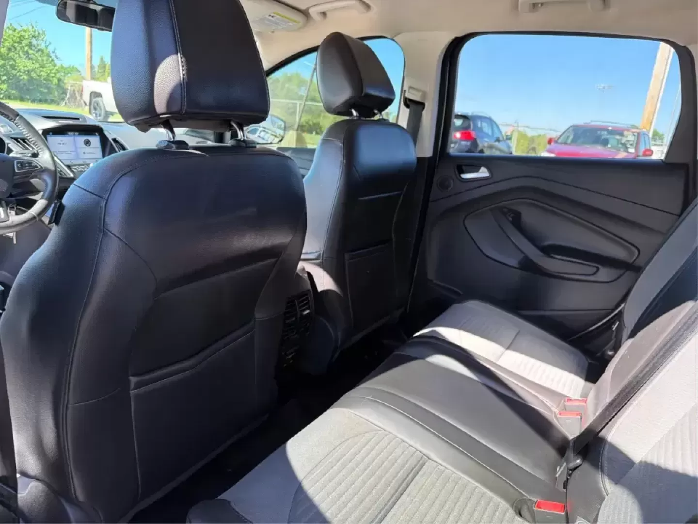 2017 Ford Escape SE (1FMCU0GD2HU) with an 1.5L L4 DOHC 16V engine, 6A transmission, located at 401 Woodman Dr, Riverside, OH, 45431, (937) 908-9800, 39.760899, -84.123421 - Picture a weekday that starts with a smooth commute up N County Rd 25A, turns into easy school drop-offs, and ends with a weekend escape to Indian Lake or a quick run down I75 for shopping and dinner-this 2017 Ford Escape SE is built for real life in and around Piqua, Ohio. Finished in standout Whit - Photo#10