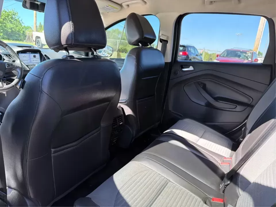 2017 Ford Escape SE (1FMCU0GD2HU) with an 1.5L L4 DOHC 16V engine, 6A transmission, located at 401 Woodman Dr, Riverside, OH, 45431, (937) 908-9800, 39.760899, -84.123421 - Picture a weekday that starts with a smooth commute up N County Rd 25A, turns into easy school drop-offs, and ends with a weekend escape to Indian Lake or a quick run down I75 for shopping and dinner-this 2017 Ford Escape SE is built for real life in and around Piqua, Ohio. Finished in standout Whit - Photo#10