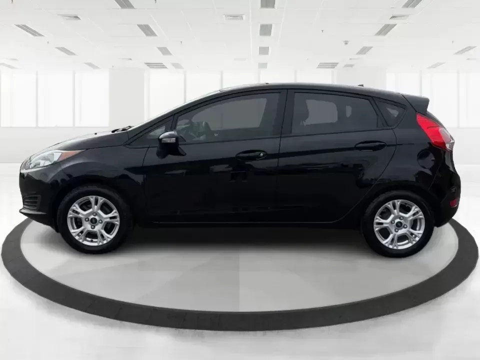 2016 Ford Fiesta SE (3FADP4EJ8GM) with an 1.6L L4 DOHC 16V engine, located at 8750 N County Rd 25A, Piqua, OH, 45356, (937) 908-9800, 40.164391, -84.232513 - Need a smart, easy-to-park hatchback that makes daily life simpler-whether you're commuting up I-75, running errands around downtown Piqua, or packing up for a weekend at Lock 9 Park? This 2016 Ford Fiesta SE Hatchback in Shadow Black delivers big practicality in a small, budget-friendly footprint, - Photo#5