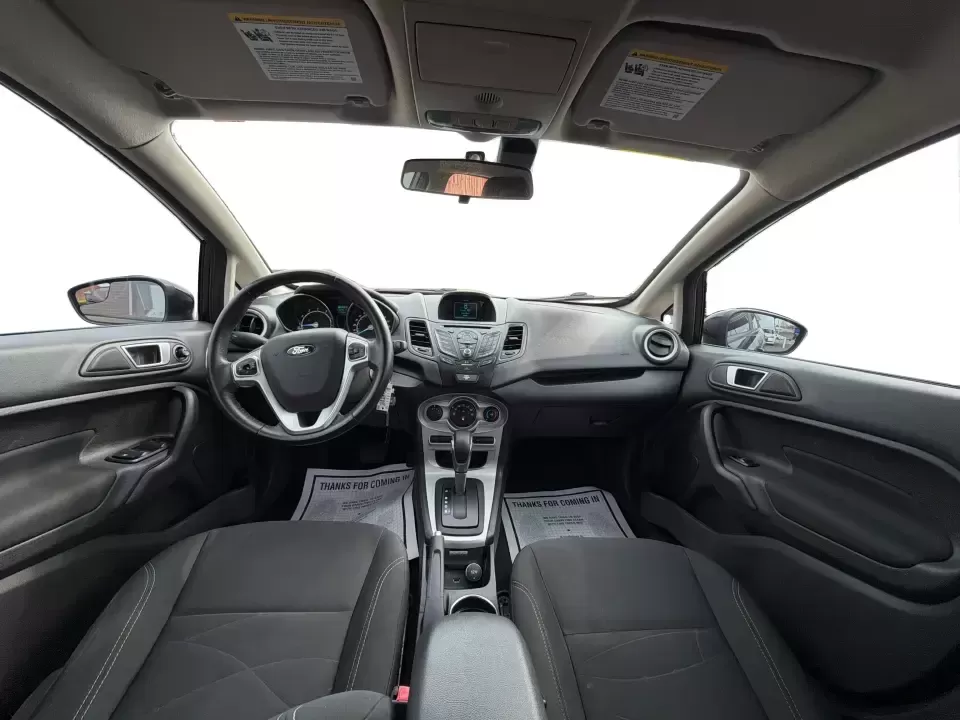 2016 Ford Fiesta SE (3FADP4EJ8GM) with an 1.6L L4 DOHC 16V engine, located at 8750 N County Rd 25A, Piqua, OH, 45356, (937) 908-9800, 40.164391, -84.232513 - Need a smart, easy-to-park hatchback that makes daily life simpler-whether you're commuting up I-75, running errands around downtown Piqua, or packing up for a weekend at Lock 9 Park? This 2016 Ford Fiesta SE Hatchback in Shadow Black delivers big practicality in a small, budget-friendly footprint, - Photo#20