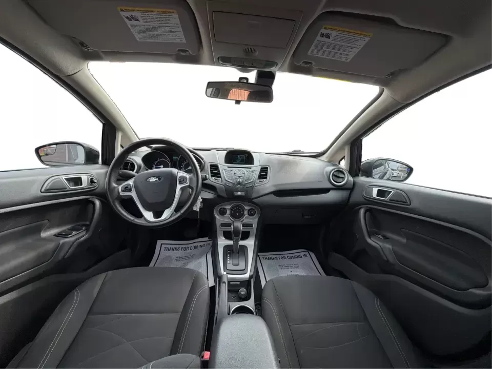 2016 Ford Fiesta SE (3FADP4EJ8GM) with an 1.6L L4 DOHC 16V engine, located at 8750 N County Rd 25A, Piqua, OH, 45356, (937) 908-9800, 40.164391, -84.232513 - Need a smart, easy-to-park hatchback that makes daily life simpler-whether you're commuting up I-75, running errands around downtown Piqua, or packing up for a weekend at Lock 9 Park? This 2016 Ford Fiesta SE Hatchback in Shadow Black delivers big practicality in a small, budget-friendly footprint, - Photo#21