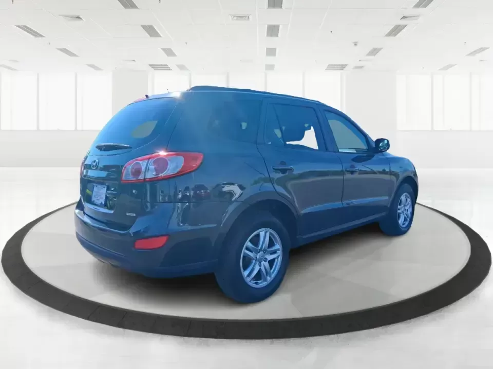 2012 Hyundai Santa Fe GLS (5XYZGDABXCG) with an 2.4L I-4 DOHC engine, 6-Speed Automatic transmission, located at 8750 N County Rd 25A, Piqua, OH, 45356, (937) 908-9800, 40.164391, -84.232513 - Pack up the kids, load the groceries, and head out for a weekend escape-this 2012 Hyundai Santa Fe GLS is the kind of SUV that fits real life in West Central Ohio. Whether you're commuting up N County Rd 25A toward Troy, running errands near downtown Piqua, or planning a road trip out past the Great - Photo#2