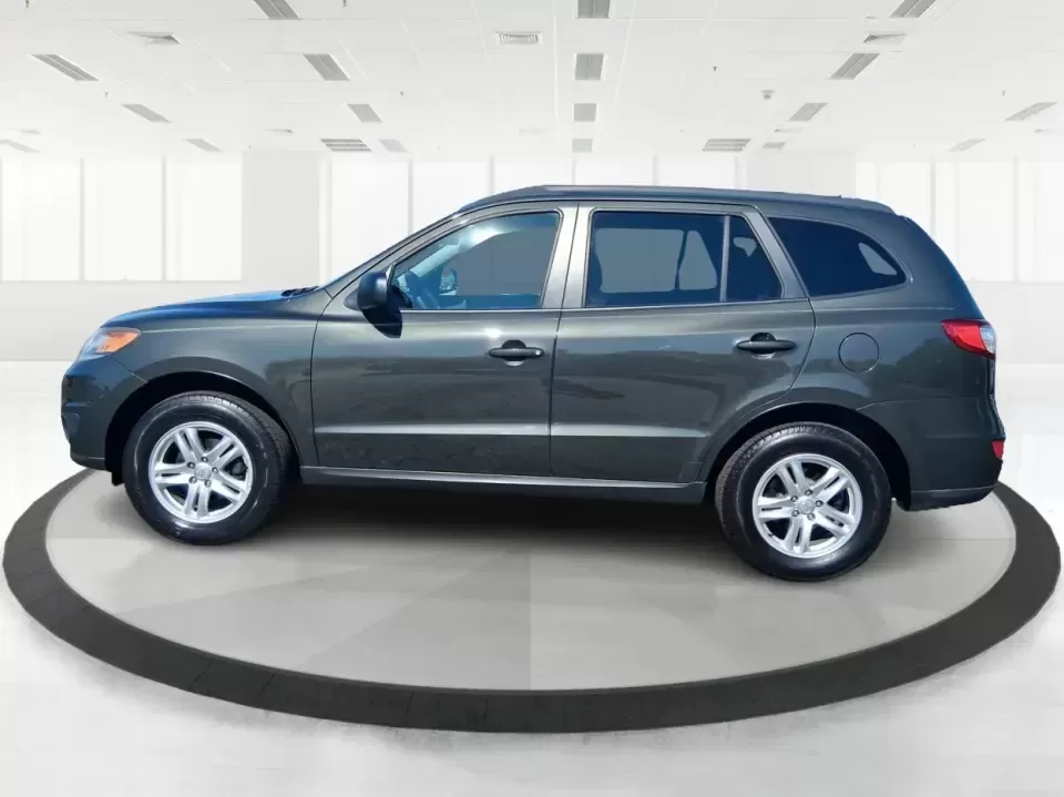 2012 Hyundai Santa Fe GLS (5XYZGDABXCG) with an 2.4L I-4 DOHC engine, 6-Speed Automatic transmission, located at 8750 N County Rd 25A, Piqua, OH, 45356, (937) 908-9800, 40.164391, -84.232513 - Pack up the kids, load the groceries, and head out for a weekend escape-this 2012 Hyundai Santa Fe GLS is the kind of SUV that fits real life in West Central Ohio. Whether you're commuting up N County Rd 25A toward Troy, running errands near downtown Piqua, or planning a road trip out past the Great - Photo#5