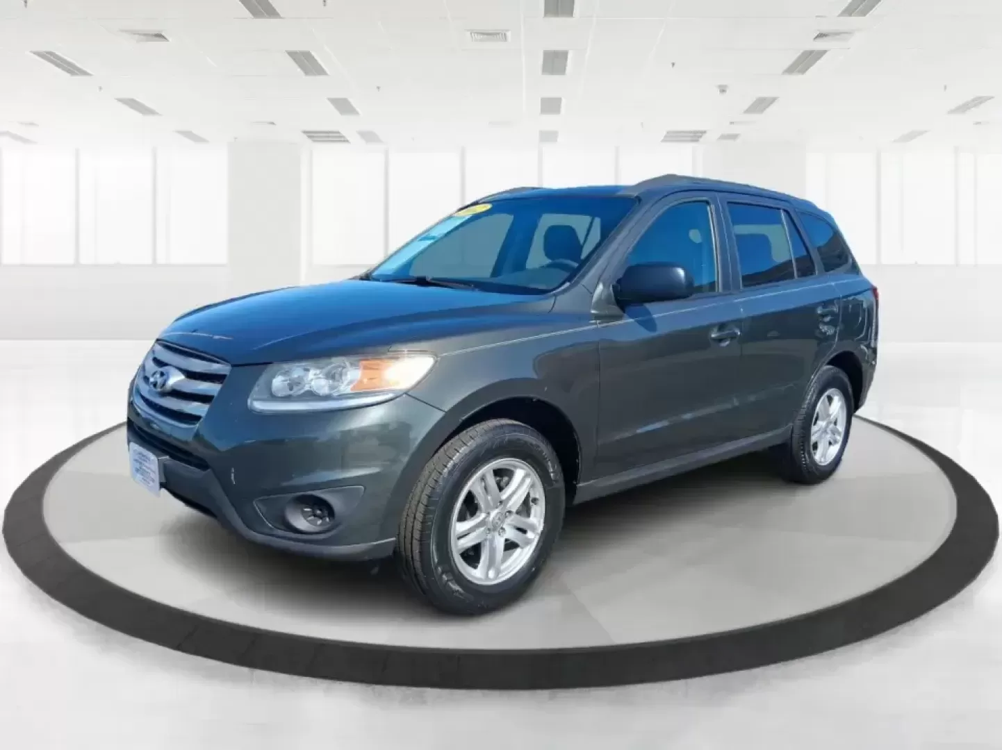 2012 Hyundai Santa Fe GLS (5XYZGDABXCG) with an 2.4L I-4 DOHC engine, 6-Speed Automatic transmission, located at 8750 N County Rd 25A, Piqua, OH, 45356, (937) 908-9800, 40.164391, -84.232513 - Pack up the kids, load the groceries, and head out for a weekend escape-this 2012 Hyundai Santa Fe GLS is the kind of SUV that fits real life in West Central Ohio. Whether you're commuting up N County Rd 25A toward Troy, running errands near downtown Piqua, or planning a road trip out past the Great - Photo#8
