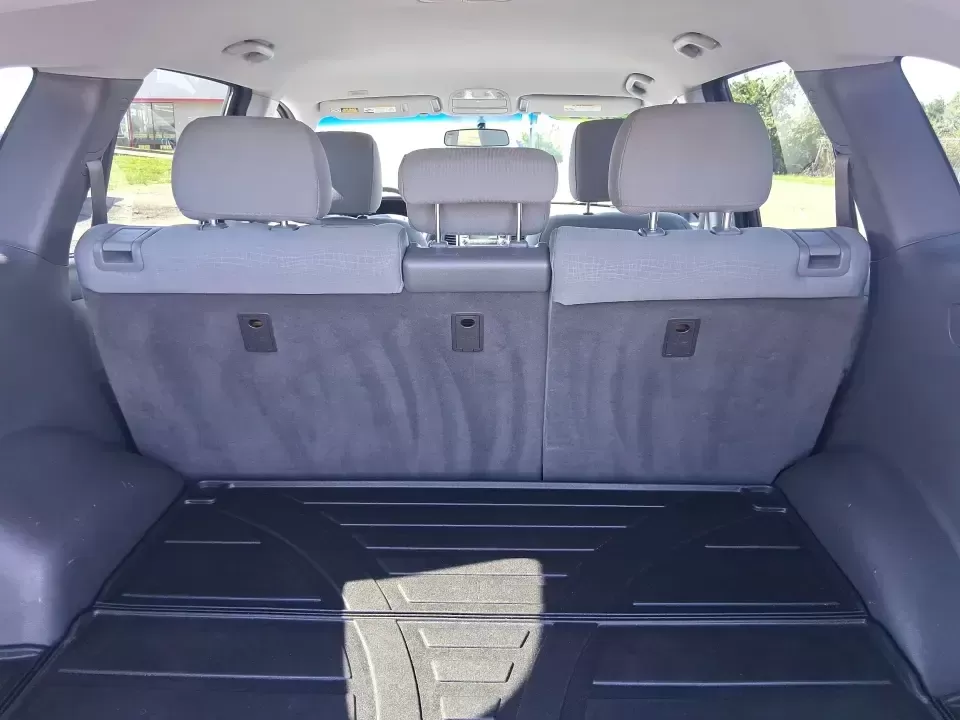 2012 Hyundai Santa Fe GLS (5XYZGDABXCG) with an 2.4L I-4 DOHC engine, 6-Speed Automatic transmission, located at 8750 N County Rd 25A, Piqua, OH, 45356, (937) 908-9800, 40.164391, -84.232513 - Pack up the kids, load the groceries, and head out for a weekend escape-this 2012 Hyundai Santa Fe GLS is the kind of SUV that fits real life in West Central Ohio. Whether you're commuting up N County Rd 25A toward Troy, running errands near downtown Piqua, or planning a road trip out past the Great - Photo#12