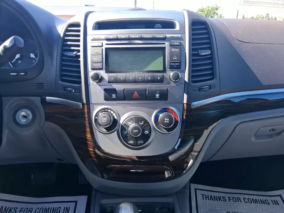 2012 Hyundai Santa Fe GLS (5XYZGDABXCG) with an 2.4L I-4 DOHC engine, 6-Speed Automatic transmission, located at 8750 N County Rd 25A, Piqua, OH, 45356, (937) 908-9800, 40.164391, -84.232513 - Pack up the kids, load the groceries, and head out for a weekend escape-this 2012 Hyundai Santa Fe GLS is the kind of SUV that fits real life in West Central Ohio. Whether you're commuting up N County Rd 25A toward Troy, running errands near downtown Piqua, or planning a road trip out past the Great - Photo#13