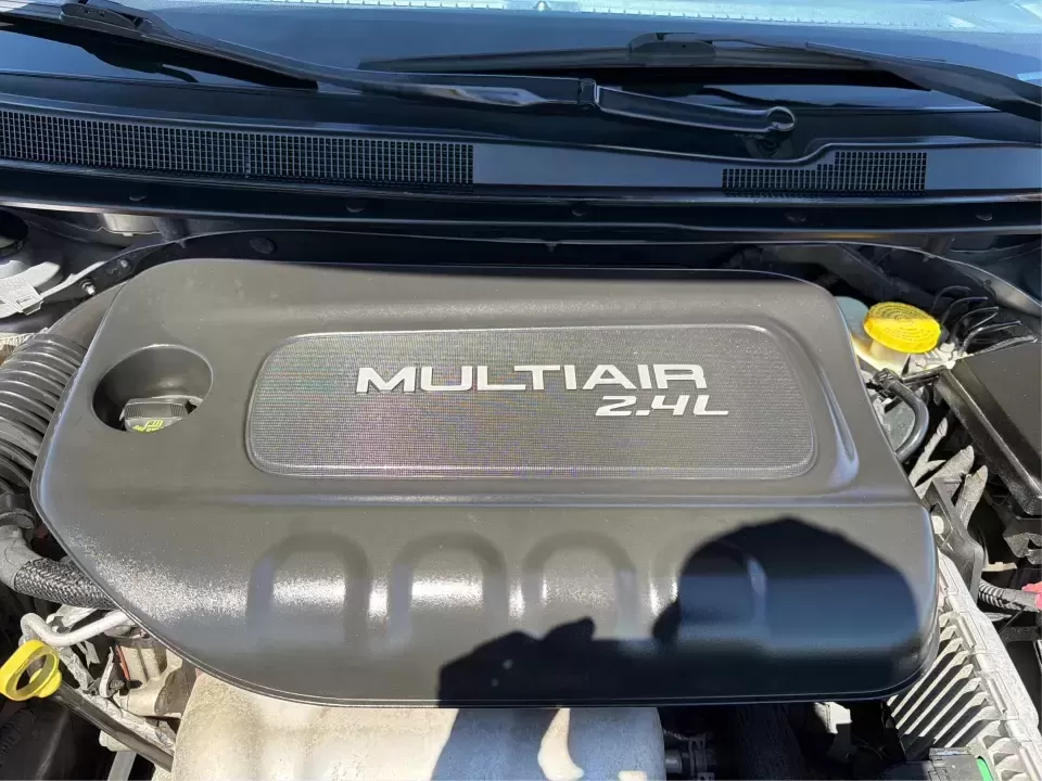 2016 Chrysler 200 Limited Platinum (1C3CCCABXGN) with an 2.4L L4 DOHC 16V engine, 9A transmission, located at 1184 Kauffman Ave, Fairborn, OH, 45324, (937) 908-9800, 39.807072, -84.030914 - Picture your next weekday commute down I675 or a smooth evening drive past Wright State University-quiet cabin, premium touches, and the kind of comfort that makes errands, school drop-offs, and date nights feel effortless. This 2016 Chrysler 200 Limited Platinum in Billet Silver Metallic Clearcoat - Photo#11