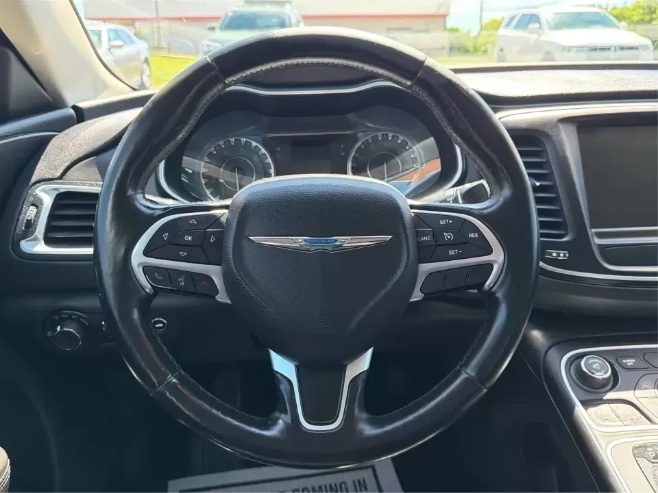 2016 Chrysler 200 Limited Platinum (1C3CCCABXGN) with an 2.4L L4 DOHC 16V engine, 9A transmission, located at 1184 Kauffman Ave, Fairborn, OH, 45324, (937) 908-9800, 39.807072, -84.030914 - Picture your next weekday commute down I675 or a smooth evening drive past Wright State University-quiet cabin, premium touches, and the kind of comfort that makes errands, school drop-offs, and date nights feel effortless. This 2016 Chrysler 200 Limited Platinum in Billet Silver Metallic Clearcoat - Photo#16