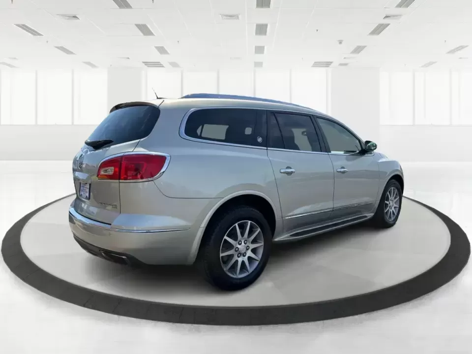 2016 Buick Enclave Leather (5GAKVBKD6GJ) with an 3.6L V-6 gasoline direct injection engine, 6-Speed Automatic Overdrive transmission, located at 8750 N County Rd 25A, Piqua, OH, 45356, (937) 908-9800, 40.164391, -84.232513 - Need one vehicle that can handle school drop-offs, grocery runs, and a weekend road trip down I-75 without feeling cramped? This 2016 Buick Enclave Leather in Iridium Metallic is built for real-life family logistics and comfortable commuting around Moraine, Dayton, and the Miami Valley-offering thre - Photo#2