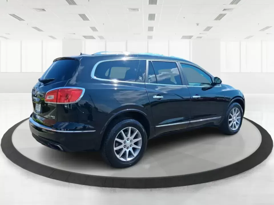 2016 Buick Enclave Leather (5GAKVBKD1GJ) with an 3.6L V-6 gasoline direct injection engine, 6-Speed Automatic Overdrive transmission, located at 1184 Kauffman Ave, Fairborn, OH, 45324, (937) 908-9800, 39.807072, -84.030914 - Weekend road trips to Yellow Springs, daily school runs across Fairborn, or a comfortable commute down I675 toward Dayton-this 2016 Buick Enclave Leather is built for real life when you need space, confidence, and premium comfort without the premium price. Finished in Ebony Twilight Metallic, this f - Photo#2