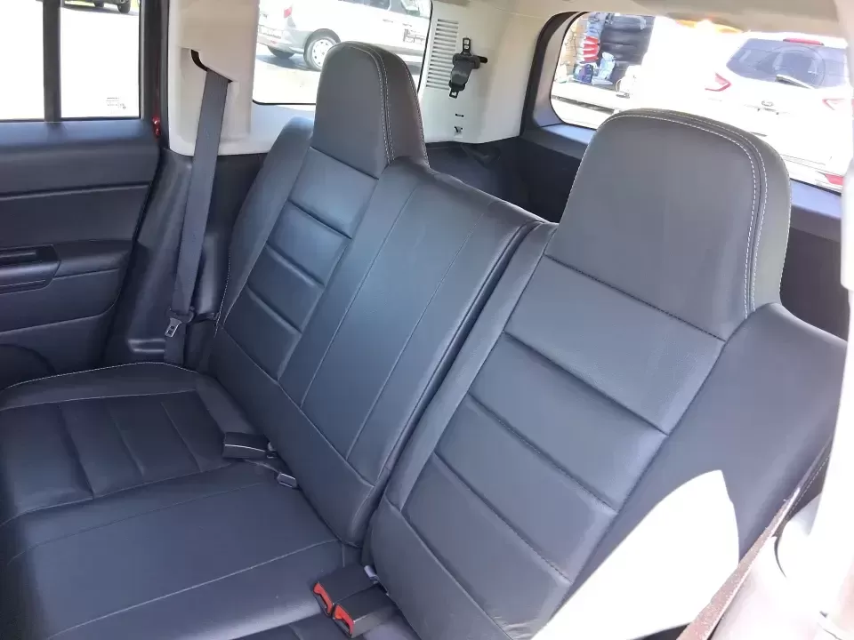 2015 Jeep Patriot High Altitude Edition (1C4NJRFB0FD) with an 2.4L I-4 DOHC engine, located at 1099 N County Rd 25A , Troy, OH, 45373, (937) 908-9800, 40.057079, -84.212883 - Picture your next Ohio weekend: loading up for a road trip to Hocking Hills, heading to a kids' tournament at Duke Park, or navigating winter backroads outside Troy with confidence. This **2015 Jeep Patriot High Altitude Edition** is the kind of SUV that fits real life-practical for daily errands, c - Photo#10