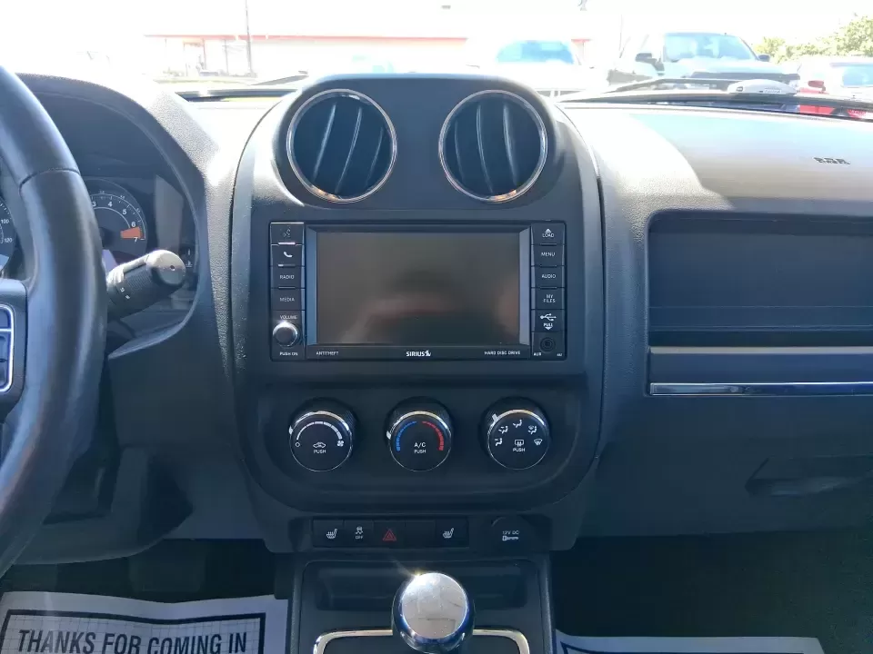 2015 Jeep Patriot High Altitude Edition (1C4NJRFB0FD) with an 2.4L I-4 DOHC engine, located at 1099 N County Rd 25A , Troy, OH, 45373, (937) 908-9800, 40.057079, -84.212883 - Picture your next Ohio weekend: loading up for a road trip to Hocking Hills, heading to a kids' tournament at Duke Park, or navigating winter backroads outside Troy with confidence. This **2015 Jeep Patriot High Altitude Edition** is the kind of SUV that fits real life-practical for daily errands, c - Photo#13