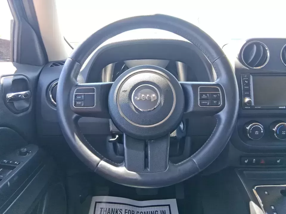 2015 Jeep Patriot High Altitude Edition (1C4NJRFB0FD) with an 2.4L I-4 DOHC engine, located at 1099 N County Rd 25A , Troy, OH, 45373, (937) 908-9800, 40.057079, -84.212883 - Picture your next Ohio weekend: loading up for a road trip to Hocking Hills, heading to a kids' tournament at Duke Park, or navigating winter backroads outside Troy with confidence. This **2015 Jeep Patriot High Altitude Edition** is the kind of SUV that fits real life-practical for daily errands, c - Photo#16