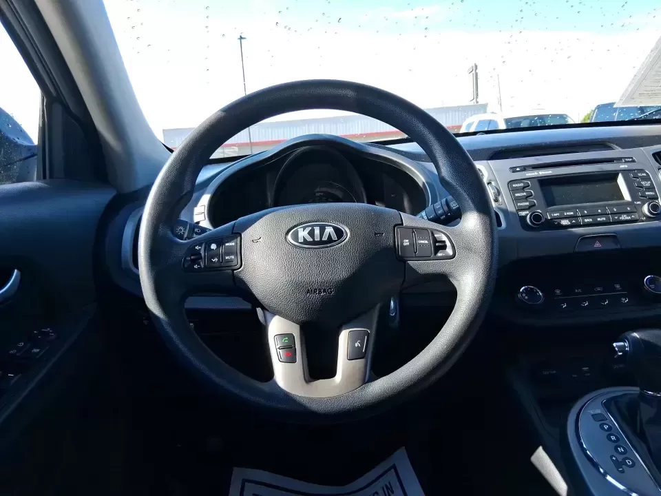 2016 Kia Sportage LX (KNDPBCAC7G7) with an Theta II 2.4L I-4 gasoline direct injection engine, 6-Speed Automatic transmission, located at 880 E. National Road, Vandalia, OH, 45377, (937) 908-9800, 39.891918, -84.183594 - Need a crossover that can handle Ohio's four seasons, school runs, and weekend getaways without draining your budget? This 2016 Kia Sportage LX is built for real life in Vandalia-whether you're commuting down I75, running errands along National Road, or packing up for a day at the Dayton Aviation He - Photo#16