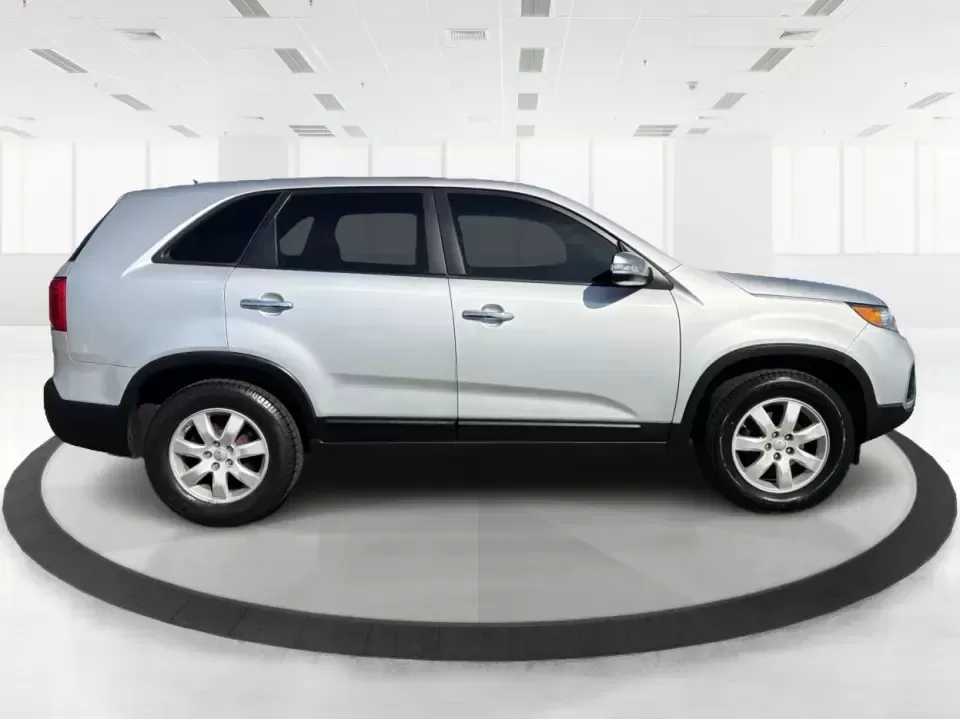 2013 Kia Sorento LX (5XYKT3A12DG) with an 2.4L I-4 DOHC engine, 6-Speed Automatic transmission, located at 8750 N County Rd 25A, Piqua, OH, 45356, (937) 908-9800, 40.164391, -84.232513 - Need one SUV that can handle the school run, a long commute up I75, and a weekend getaway to Indian Lake without blowing your budget? This 2013 Kia Sorento LX in Satin Metal is a practical, road-trip-ready SUV that's sized for real life-easy to park, comfortable for passengers, and versatile enough - Photo#1