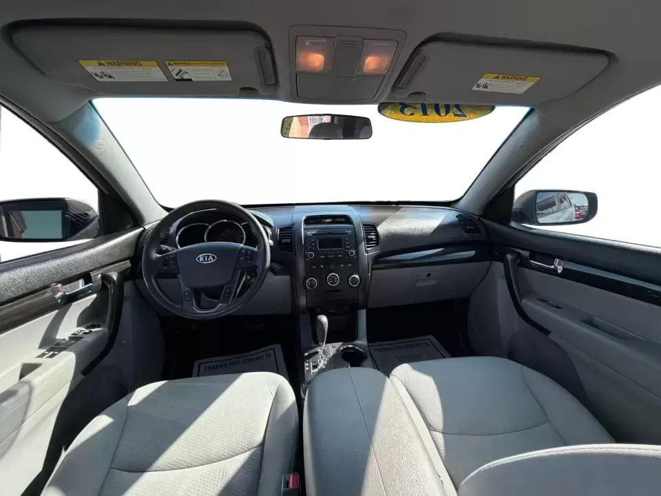 2013 Kia Sorento LX (5XYKT3A12DG) with an 2.4L I-4 DOHC engine, 6-Speed Automatic transmission, located at 8750 N County Rd 25A, Piqua, OH, 45356, (937) 908-9800, 40.164391, -84.232513 - Need one SUV that can handle the school run, a long commute up I75, and a weekend getaway to Indian Lake without blowing your budget? This 2013 Kia Sorento LX in Satin Metal is a practical, road-trip-ready SUV that's sized for real life-easy to park, comfortable for passengers, and versatile enough - Photo#21